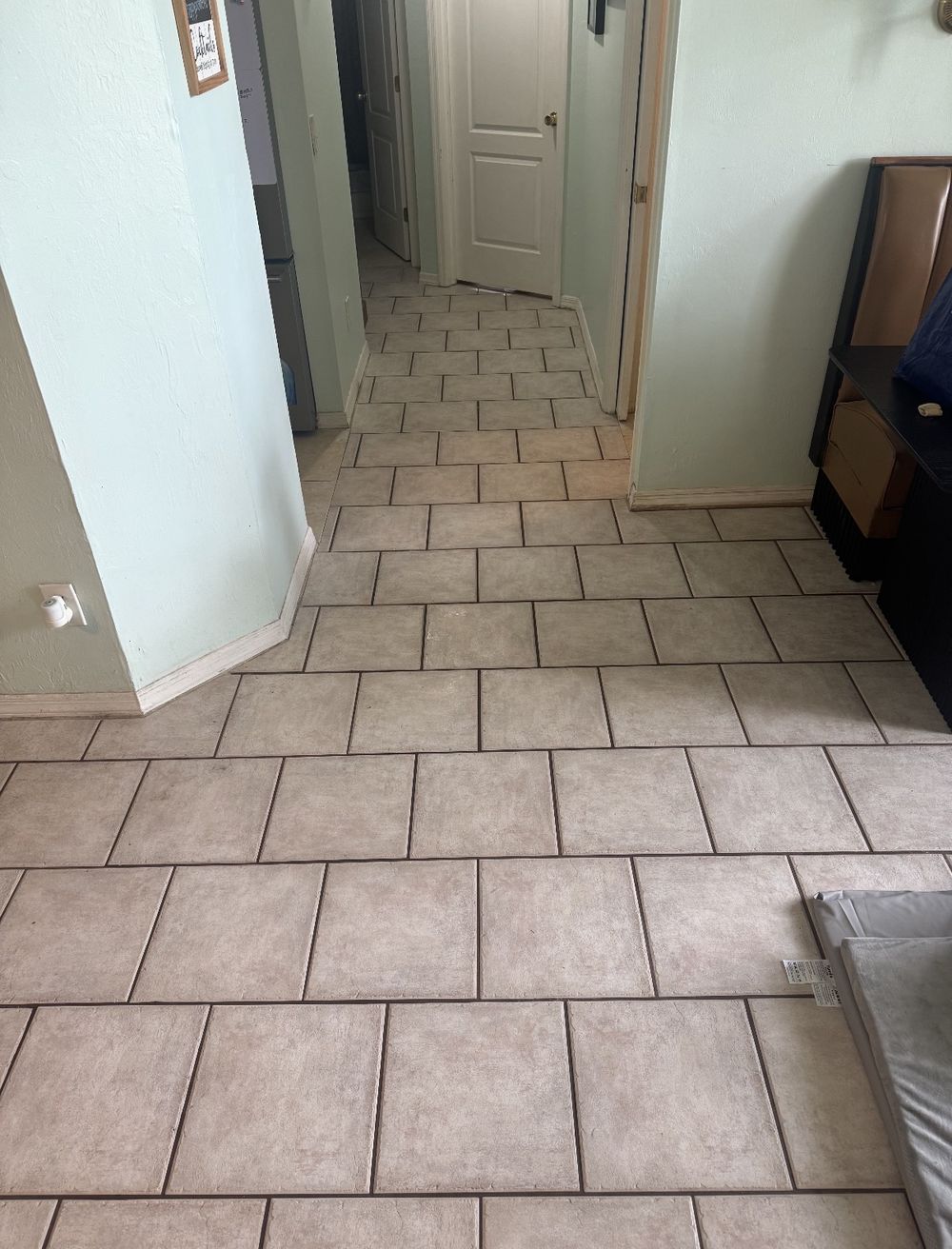 Same tile floor before professional cleaning