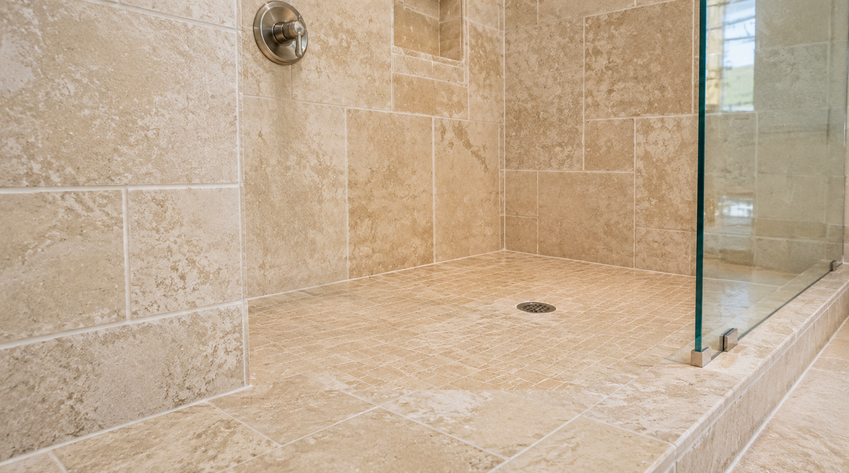 Restored travertine shower with soap scum and stains removed